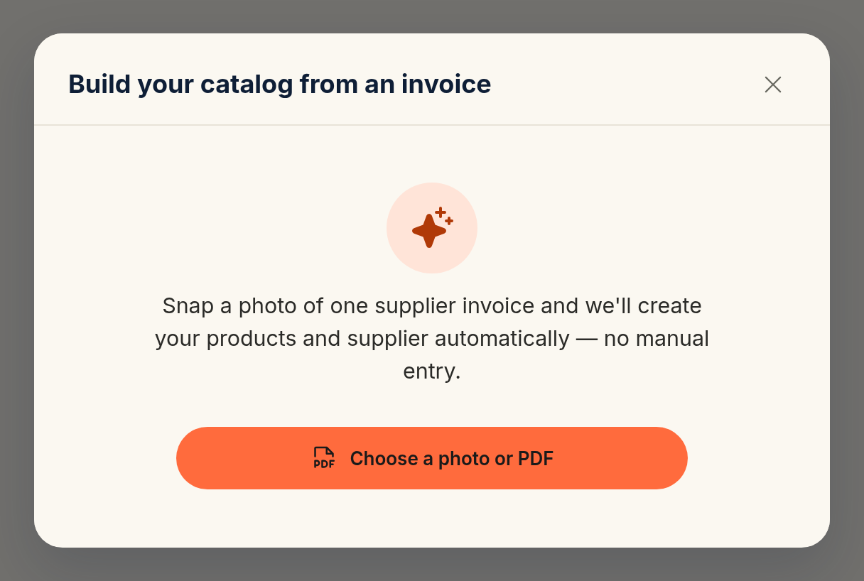 The invoice scan capture screen titled Build your catalog from an invoice, with a Choose a photo or PDF button