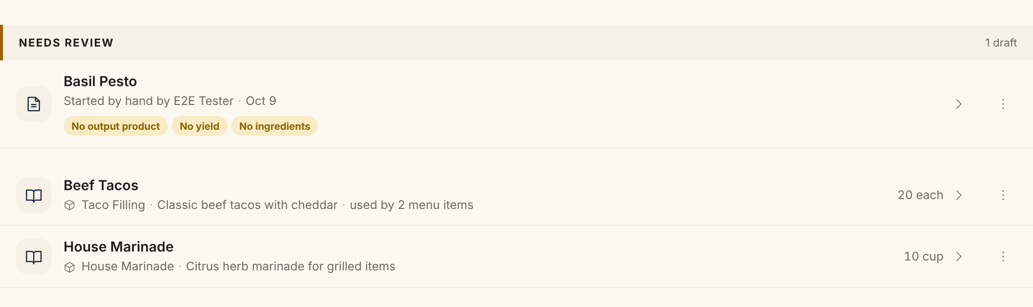 The Needs review section at the top of the Recipes page with one draft, Basil Pesto, "Started by hand", and three chips for what is missing: No output product, No yield and No ingredients. The saved recipes are listed below it